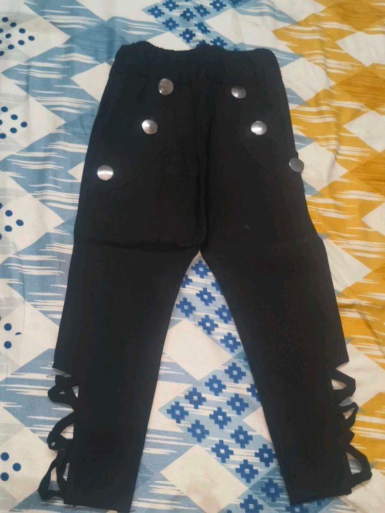 Stylish Black Pants with Decorative Buttons