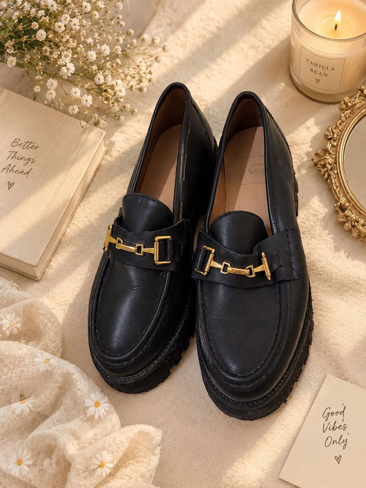 Chic Black Loafers with Gold Accent