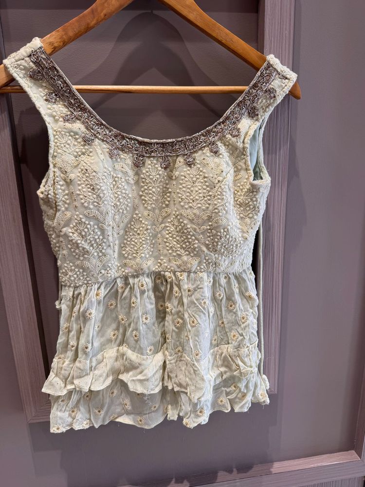 Embroidered Peplum Blouse