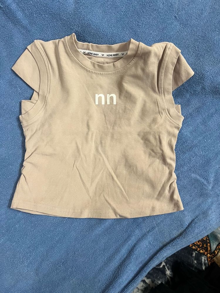 Cute Beige Sleeveless Top with Logo