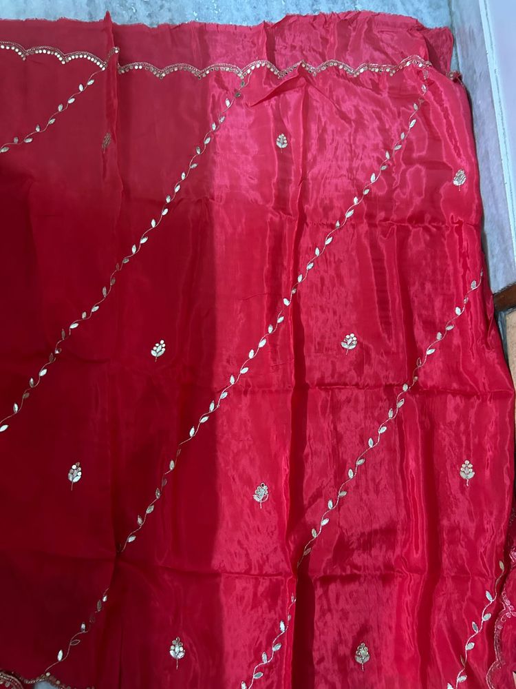 Vibrant Red Silk Saree with Embellishments