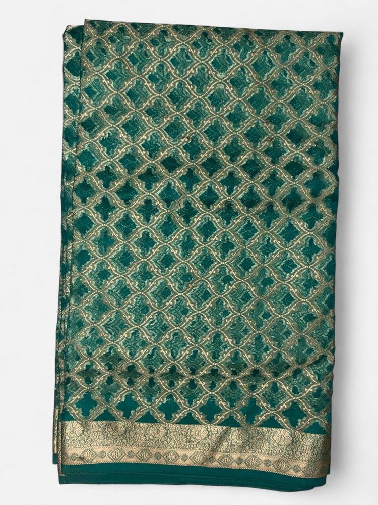 Elegant Teal Saree with Gold Weave