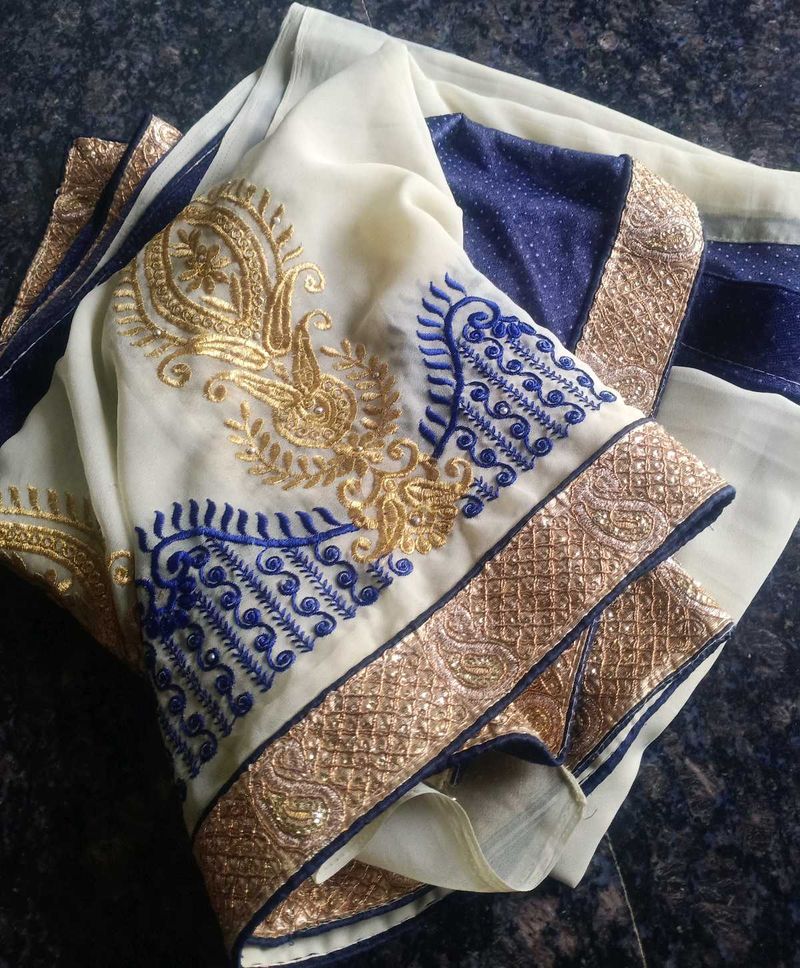 Blue And Cream Colour Saree