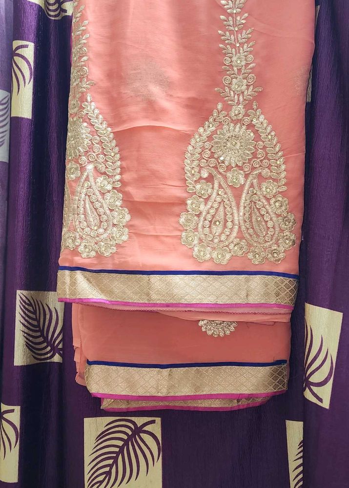 Beautiful Peach Embroidered Saree