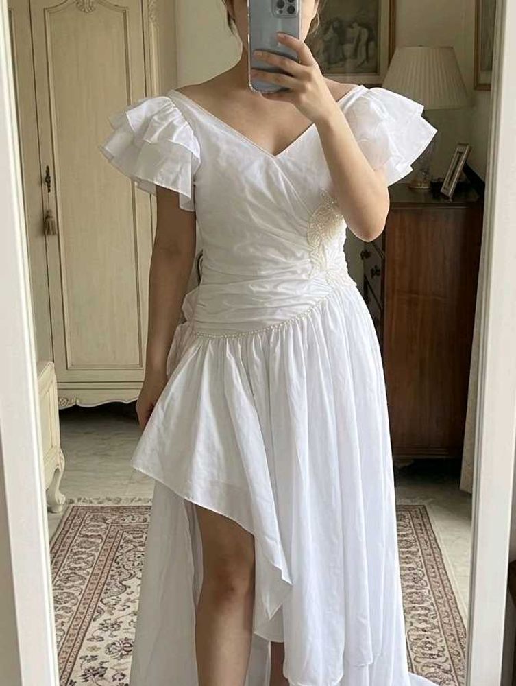 Elegant White Ruffled Gown