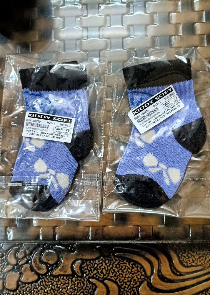 Two Pairs Of Brand New Baby Socks .. Never Used