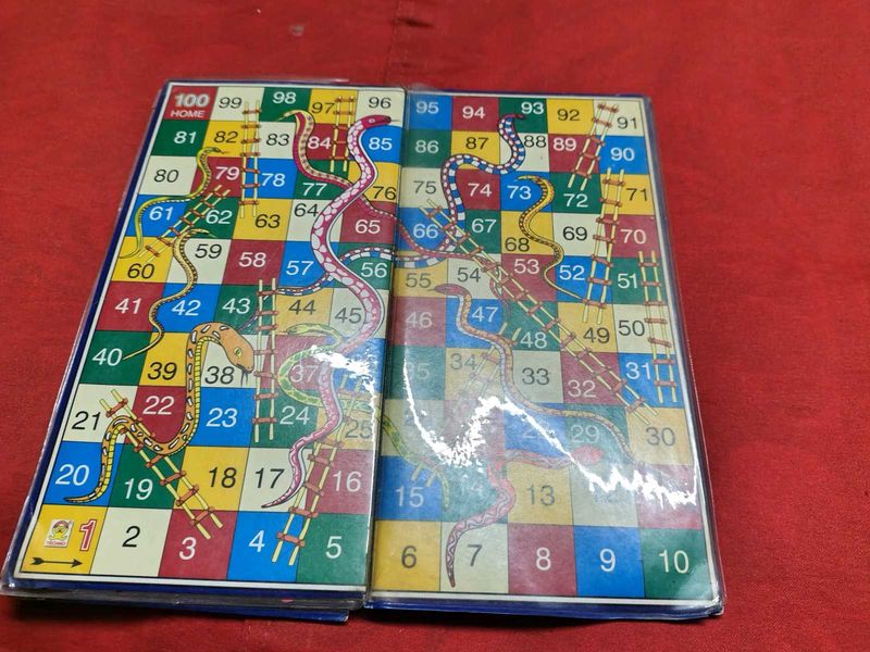 Classic Snakes and Ladders Game Board
