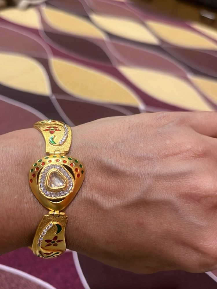 Elegant Gold Bracelet with Stones