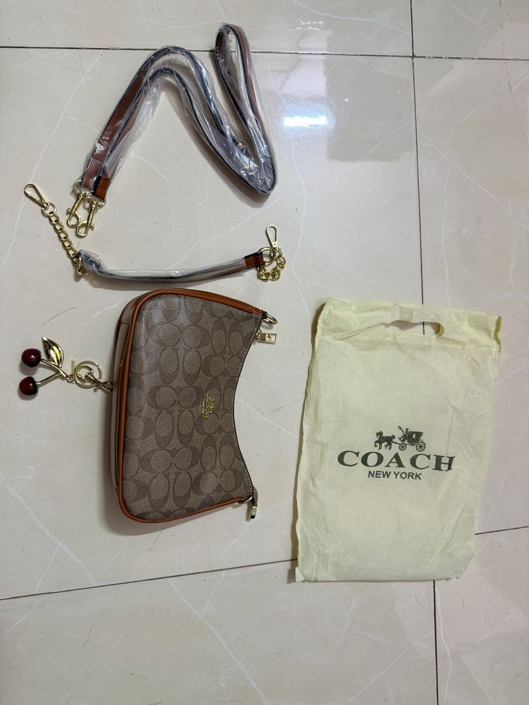 Coach Monogram Cherry Charm Crossbody Bag