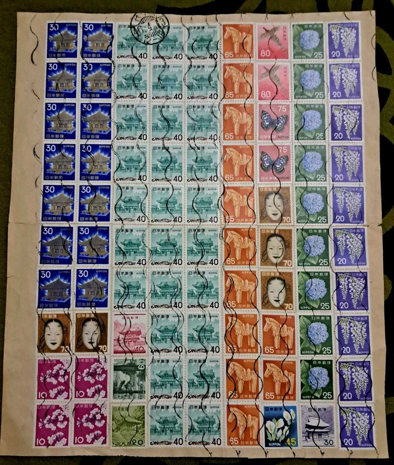 90 vintage Japanese stamps
