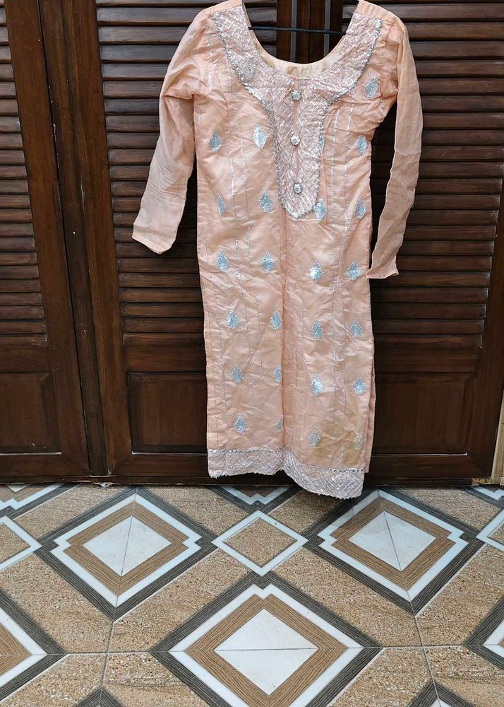 Elegant Peach Kurta with Silver Embellishments