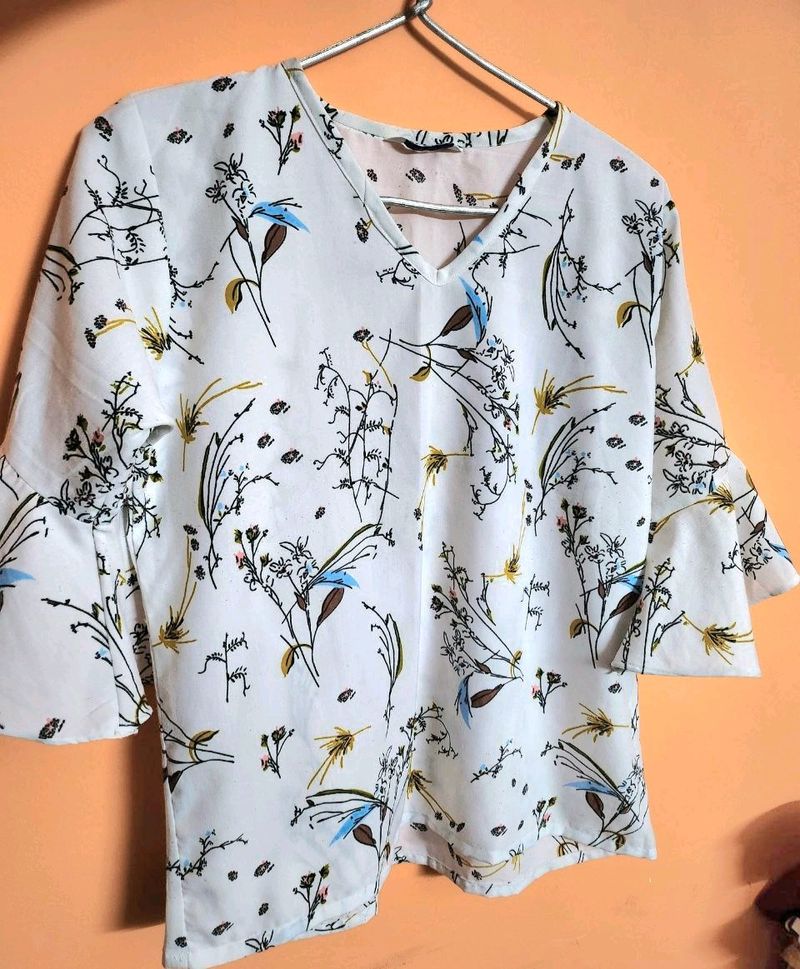 White Top With Ruffled Sleeves