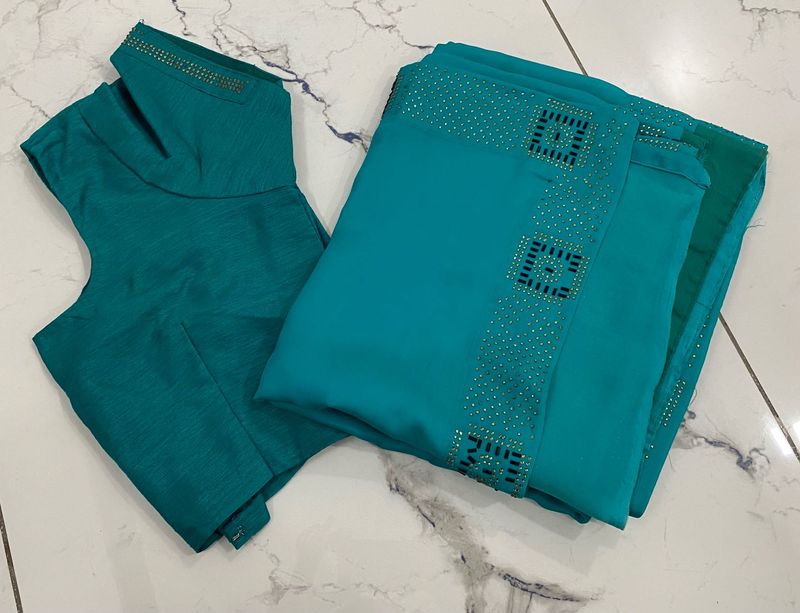 Elegant Teal saare nd blouse with Embellishments