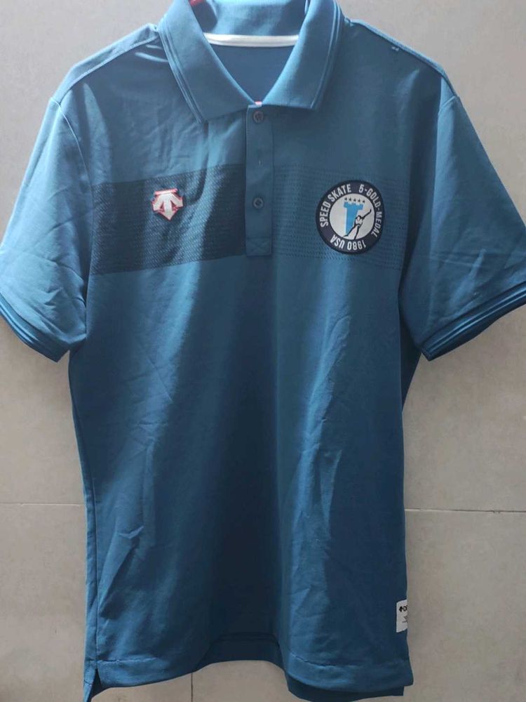descente pastel blue polo t shirt