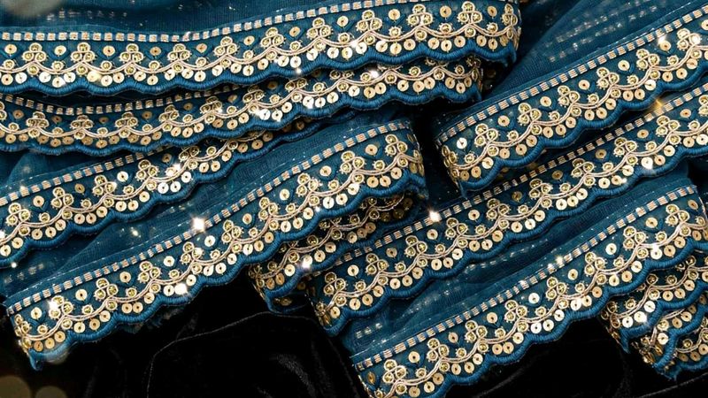Elegant Teal Sequin Trim Fabric