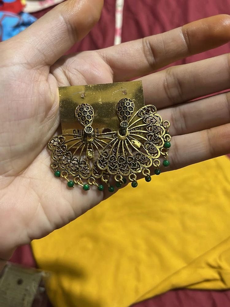 Golden chandbali with green small pearls