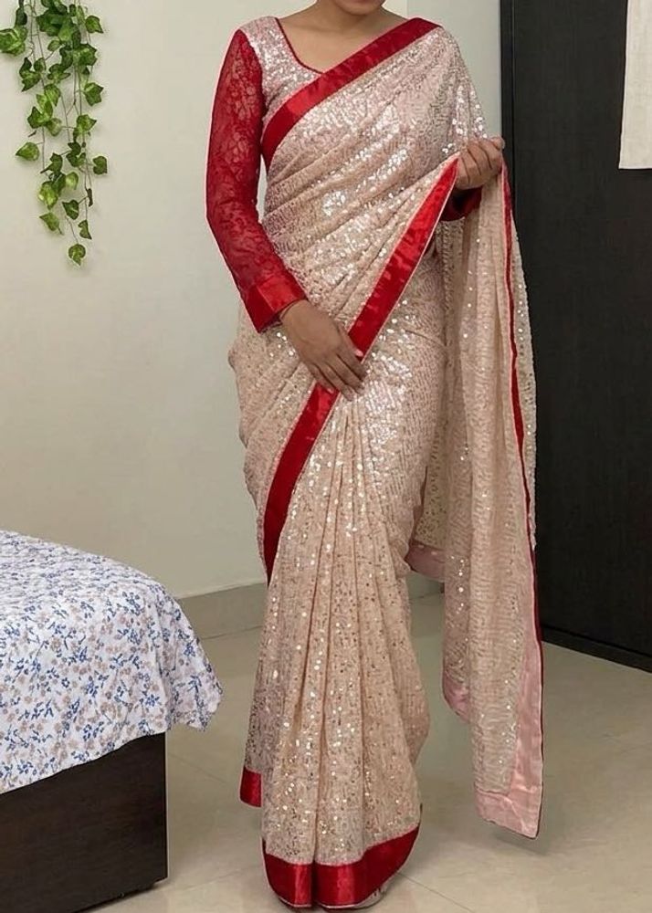 Stunning Sequined Saree with Red Border