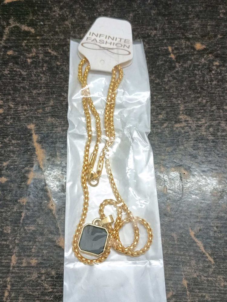 Gold Chain with Black Pendant