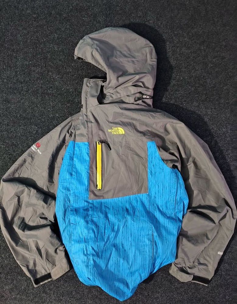 THE NORTH FACE BLUE AND GREY JACKET