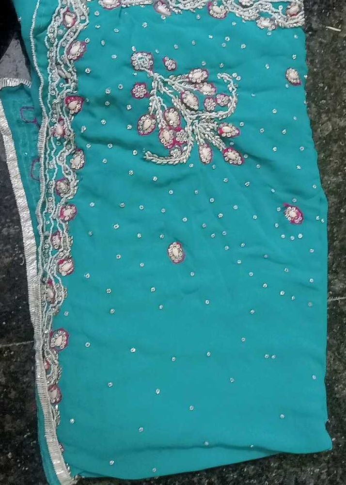 Stunning Teal Embroidered Saree