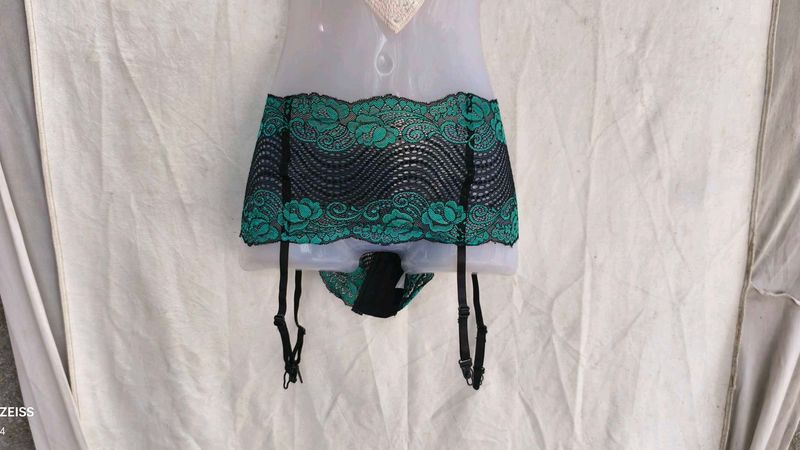 I. Black net garter