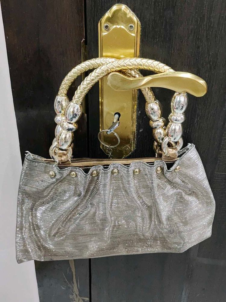 Elegant Silver Embellished Clutch