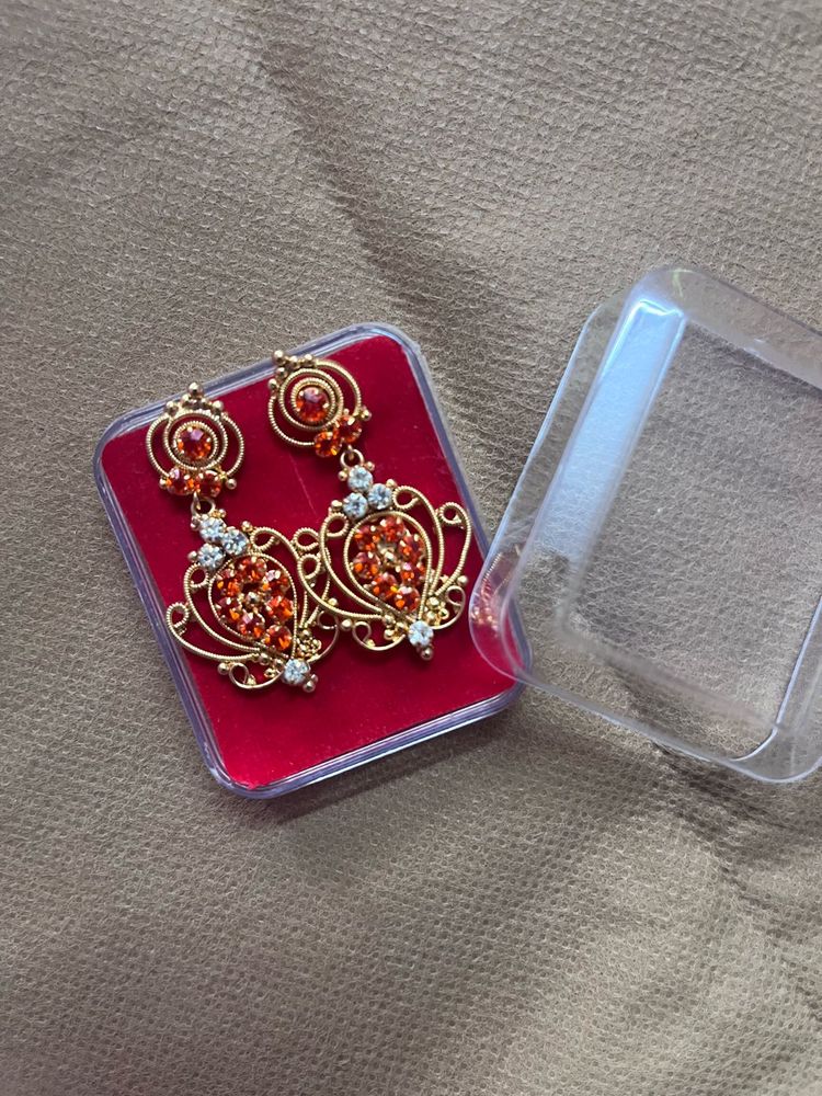 Elegant Dangle gold covering Earrings with Gemston