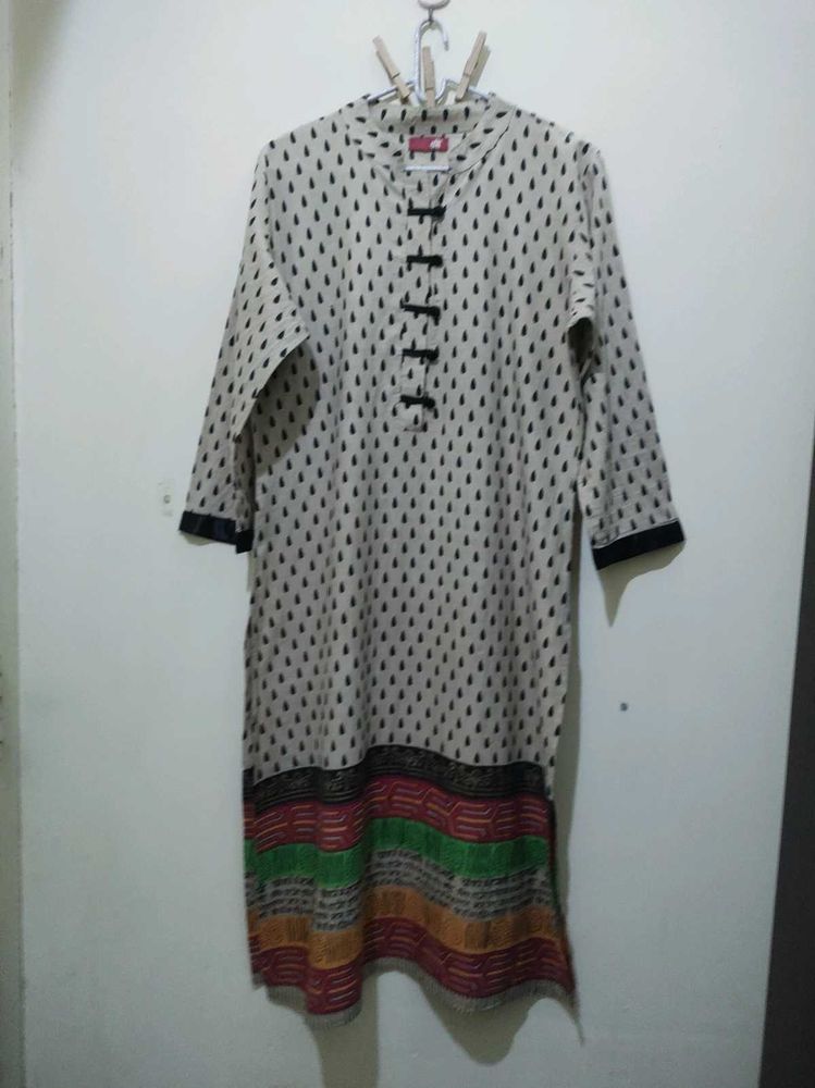 Shree beige kurta Mandarin collar black tear drop