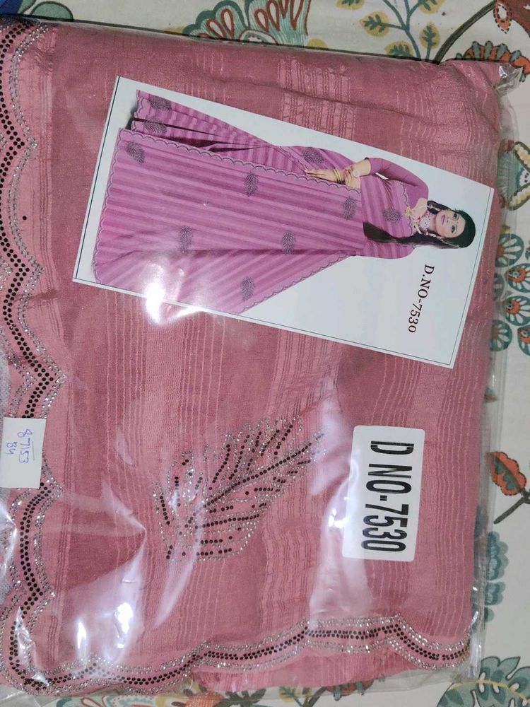 Elegant Pink Saree with Embellishments
