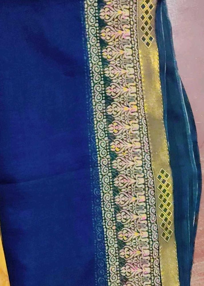 Elegant Blue Saree with Gold Border