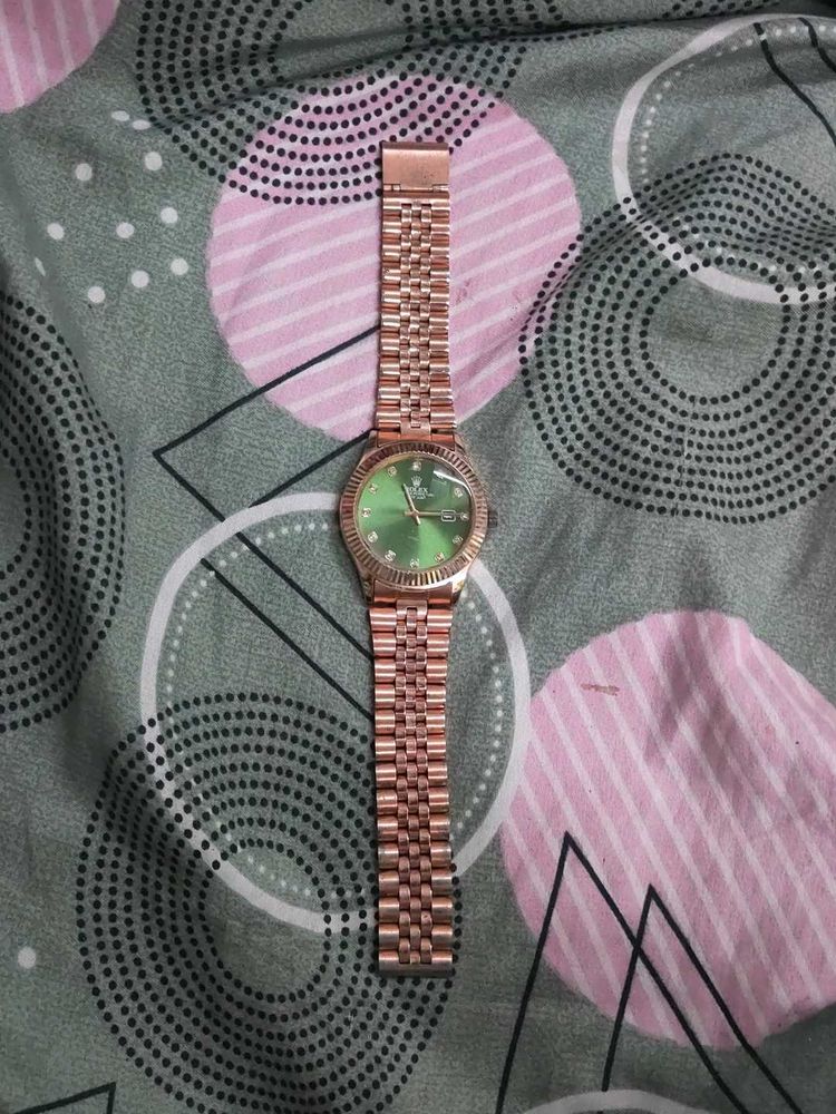 Rose Gold Watch with Green Dial