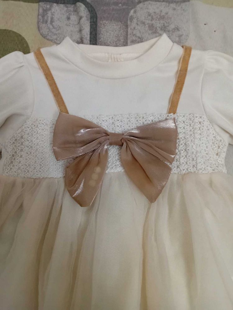 Elegant Baby Dress with Bow Detail