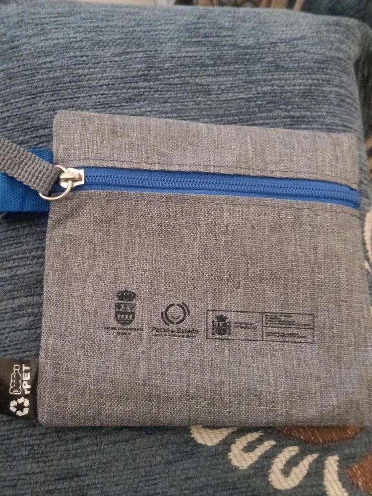 Gray zippered pouch with strap