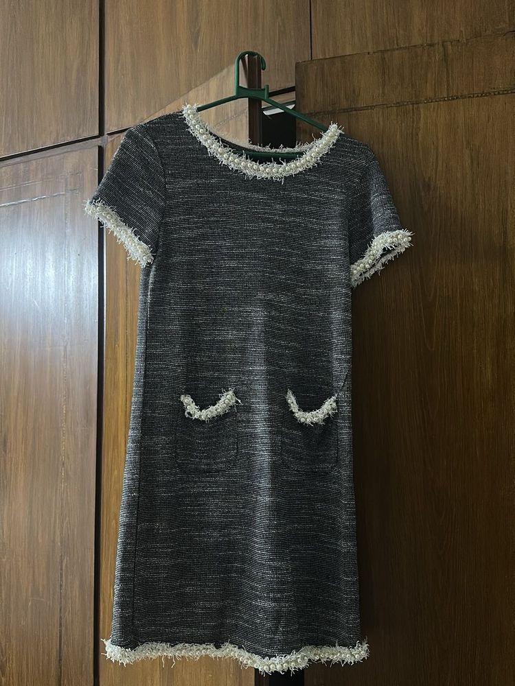 Elegant Grey Dress with White Trim
