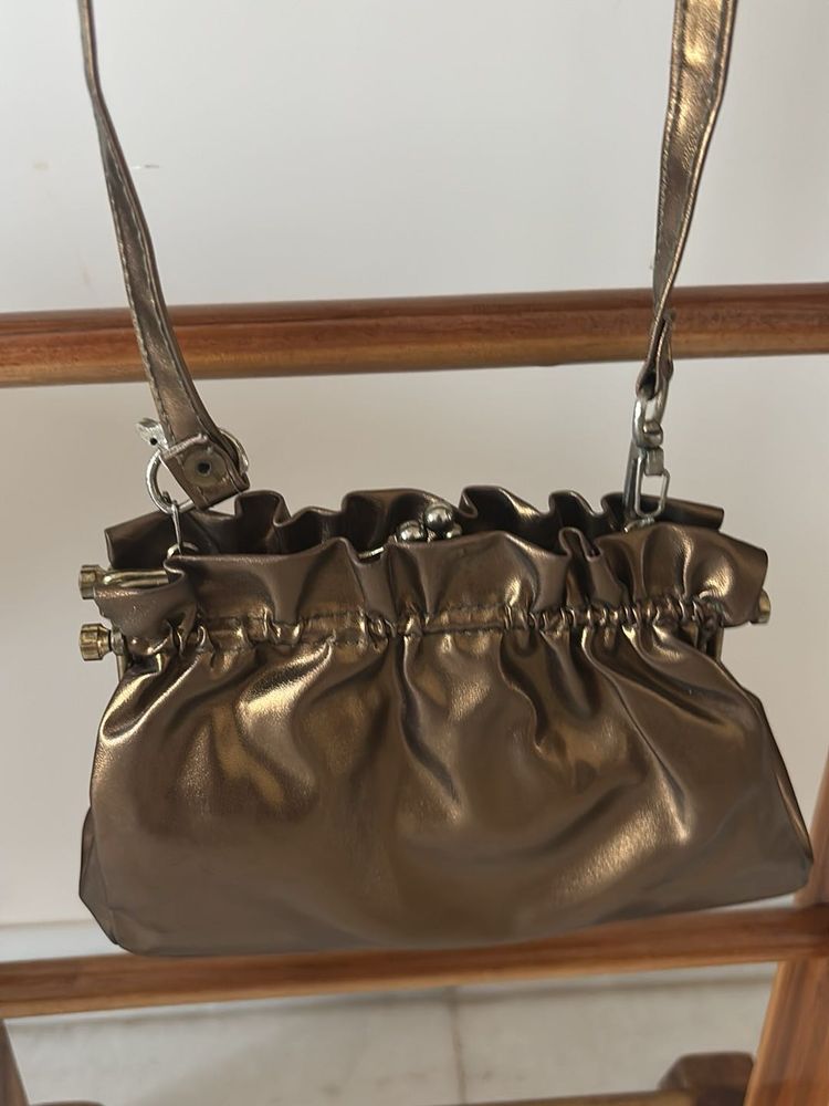 Metallic copper Ruched Clutch Bag
