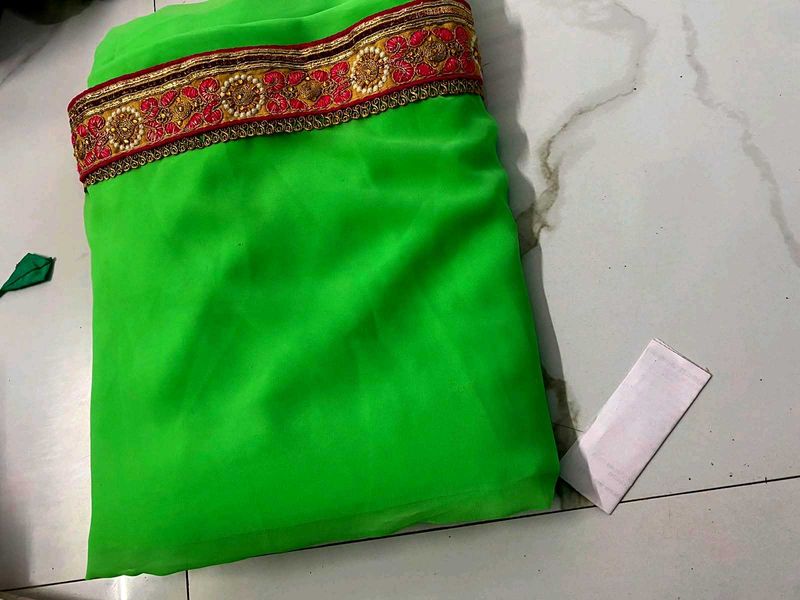Vibrant Green Saree with Embellished Border