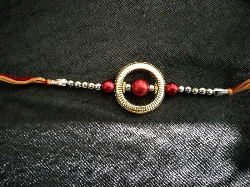 Elegant Rakhi with Red Pearls