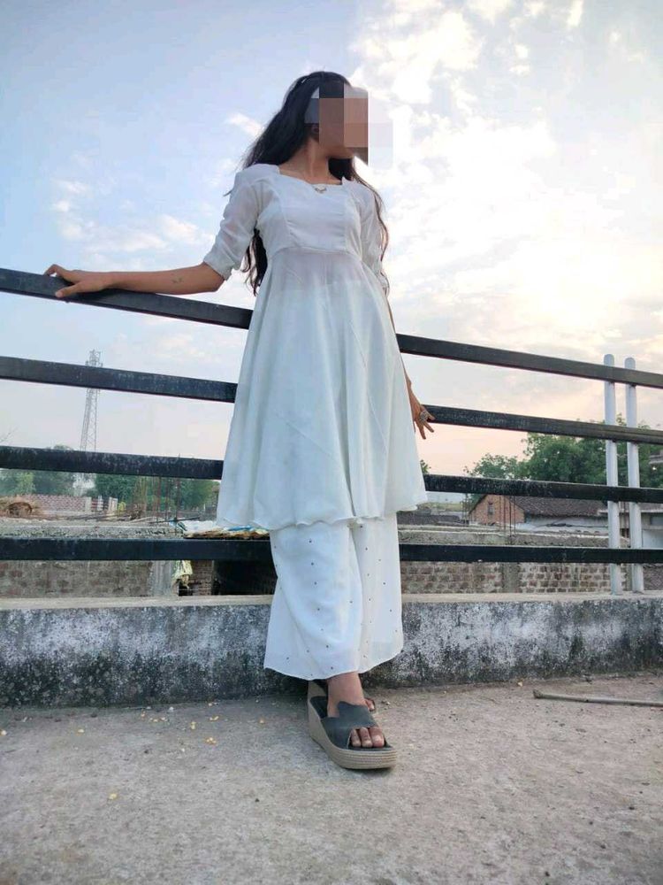 White kurta set + free orange heavy duppatta