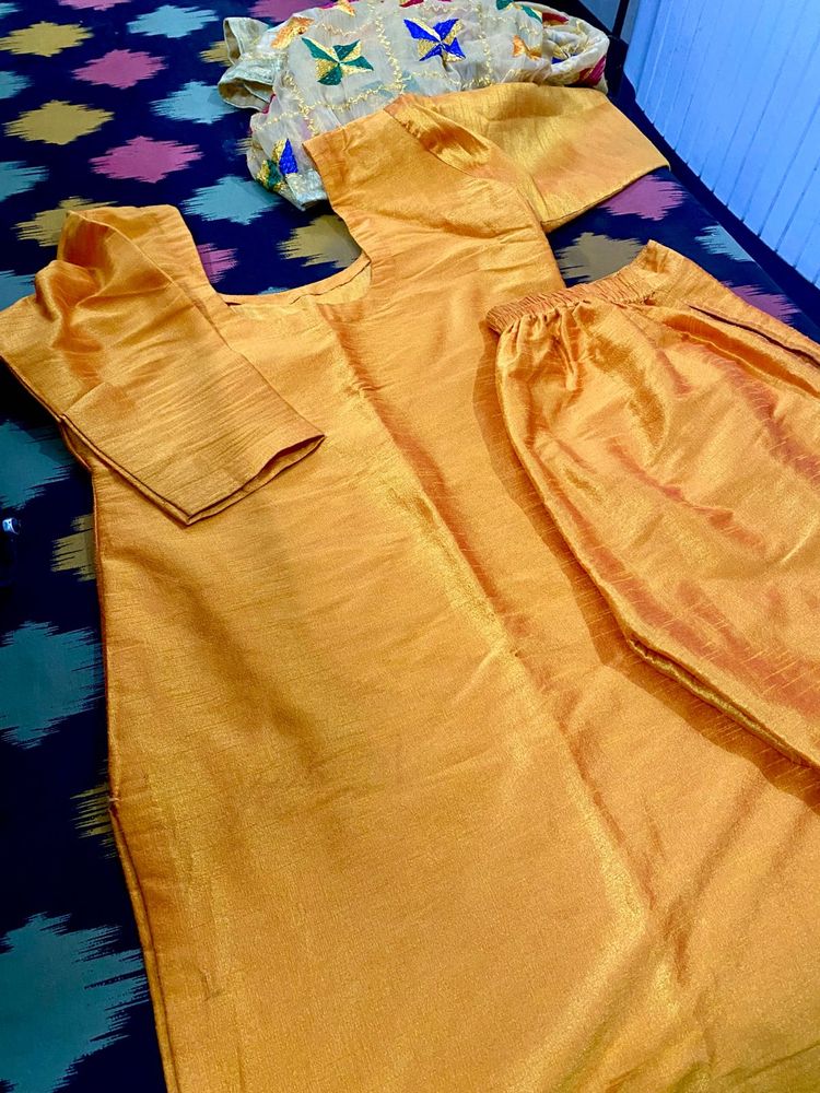 Musturd colour suit with fulkari dupatta