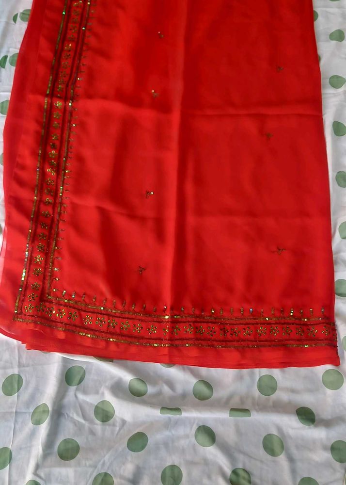 Elegant Red Saree with Gold Embellishments