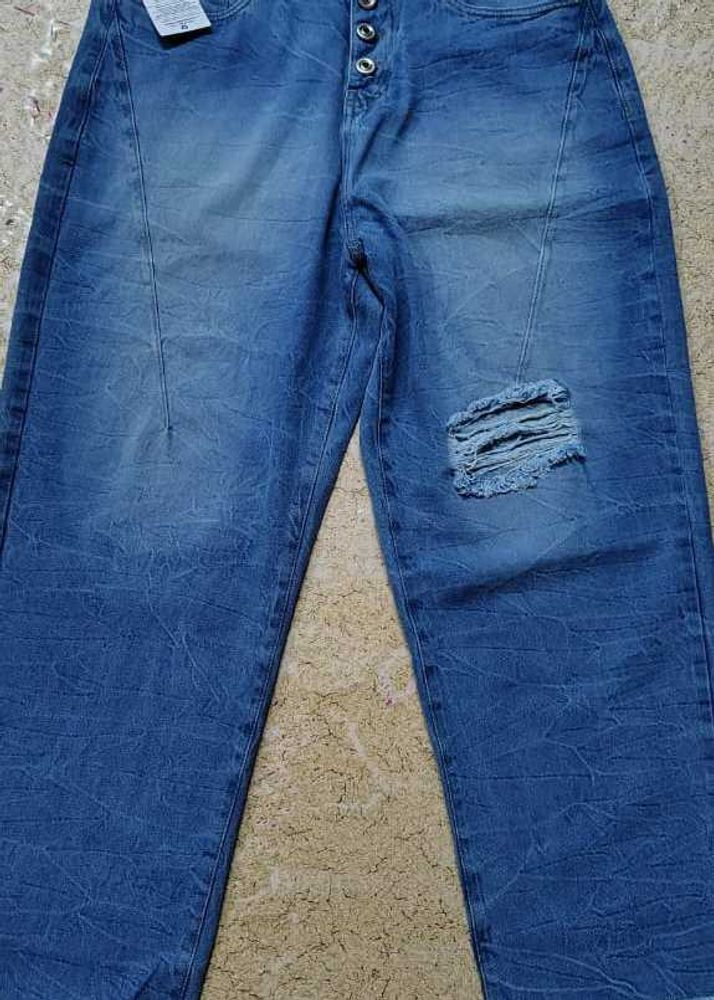 Ripped Blue Jeans