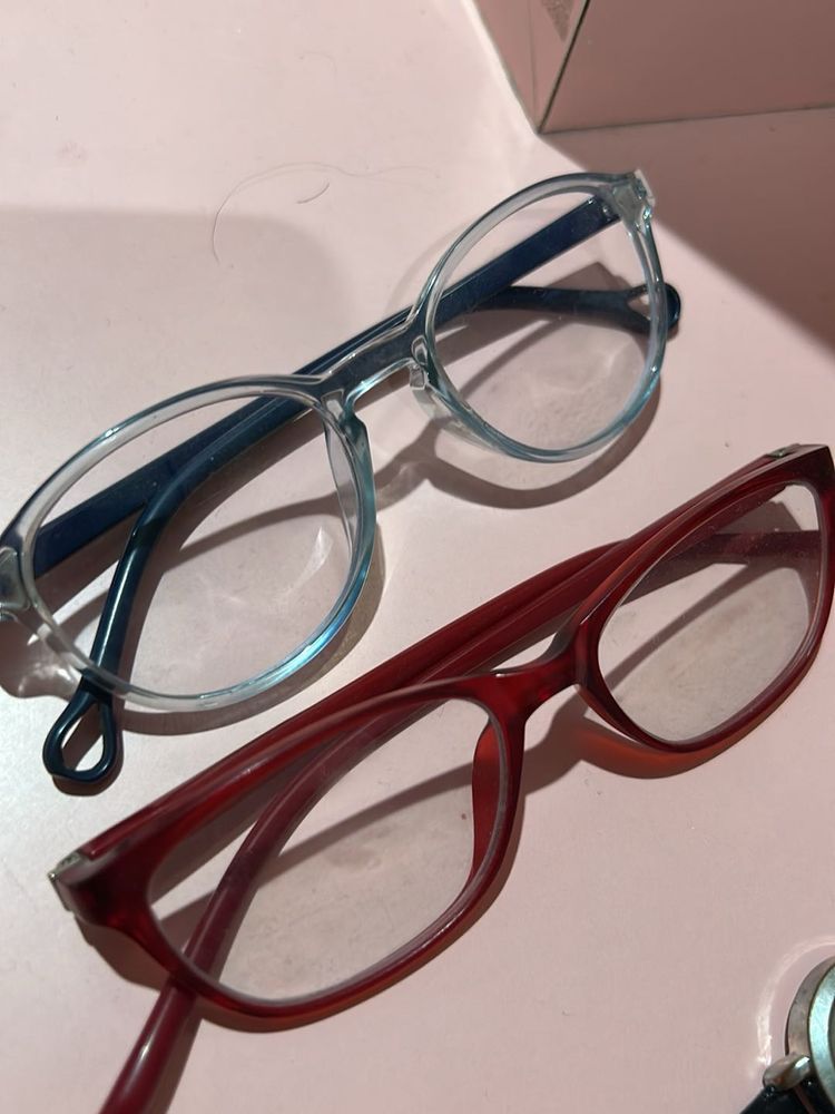 Two Pairs of Eyeglasses
