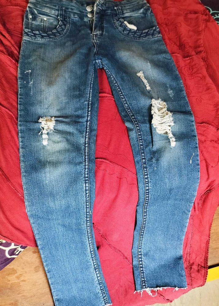 Distressed Blue Denim Jeans
