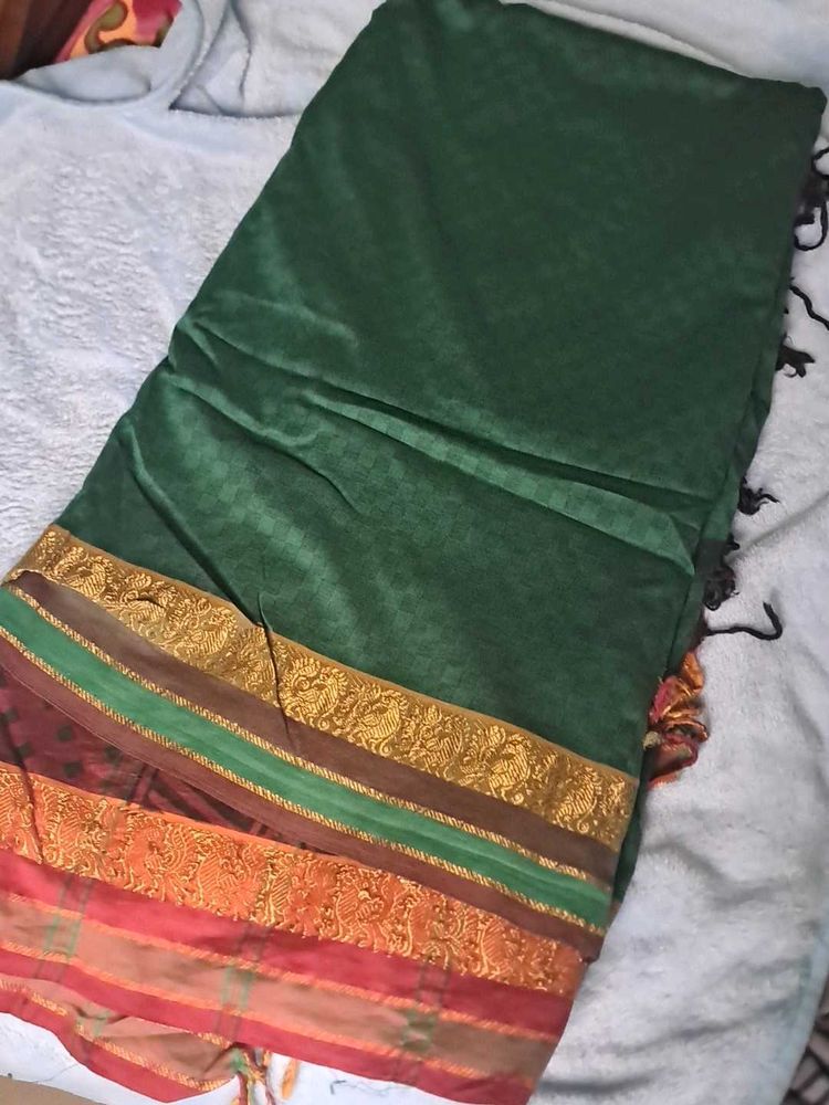 Elegant Green Saree with Ornate Border