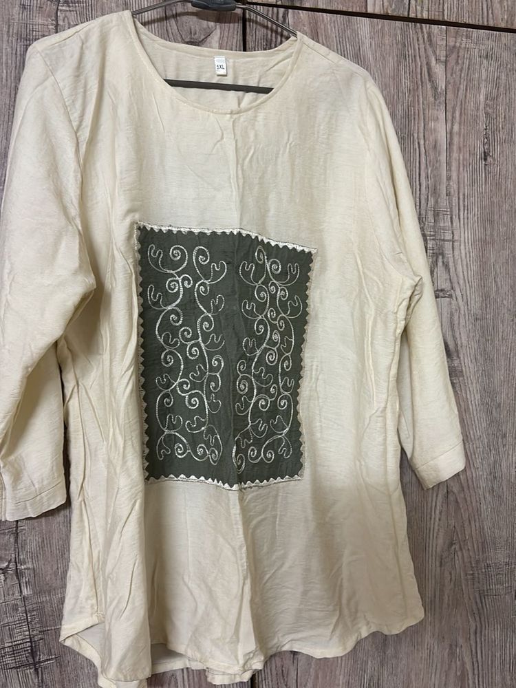 Cream top with Embroidered Patch