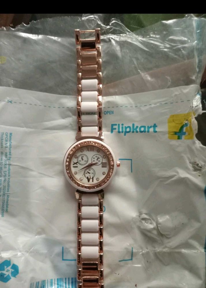 Elegant Rose Gold and White Watch