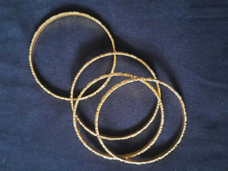Set of Four Ornate Bangles And Two thick Bangle