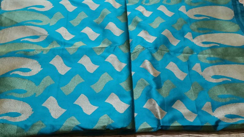 Beautiful Blue Saree with Intricate Patterns