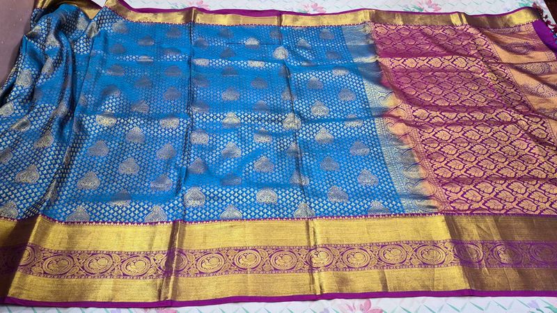 Blue Silk Saree with Gold Border