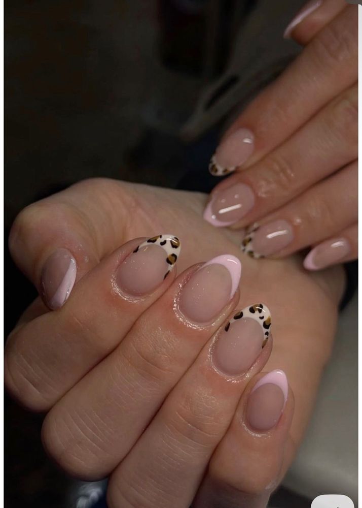 Stylish French Manicure with Leopard Accent Nails